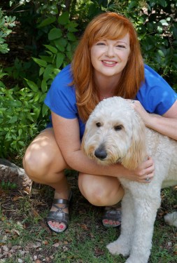 Christine the Psychic and her goldendoodle, Trixie.